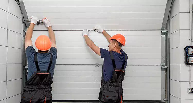 Garage Door Bottom Panel Repair in East Lake, FL