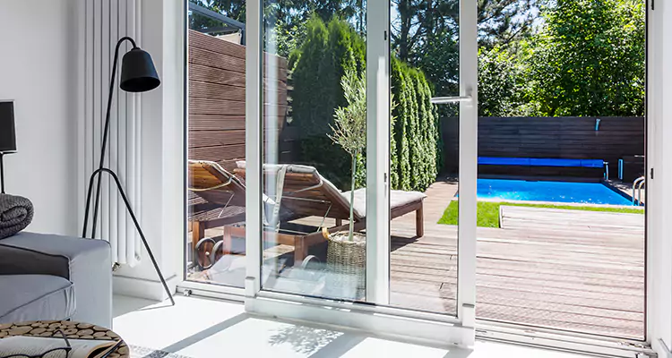 Fixing A Sliding Screen Door Roller in East Lake, FL